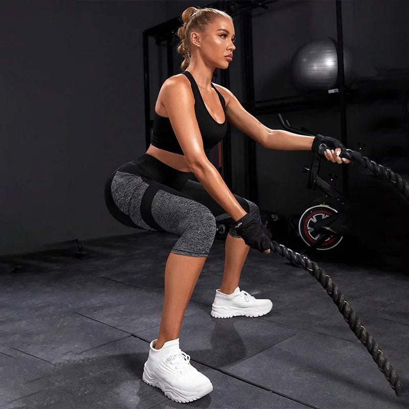 Pantalones de yoga de cintura alta con bloques de color Leggings capri con bolsillos para mujer Leggings capri de entrenamiento con control de barriga para mujer