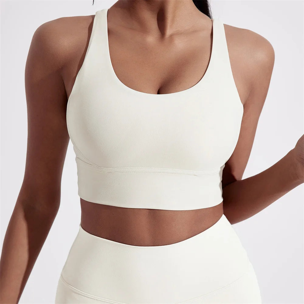 Sujetador deportivo de Color sólido con espalda cruzada para mujer, Top ajustado de alta resistencia, ropa interior de entrenamiento integral para gimnasio y Yoga con almohadilla para el pecho