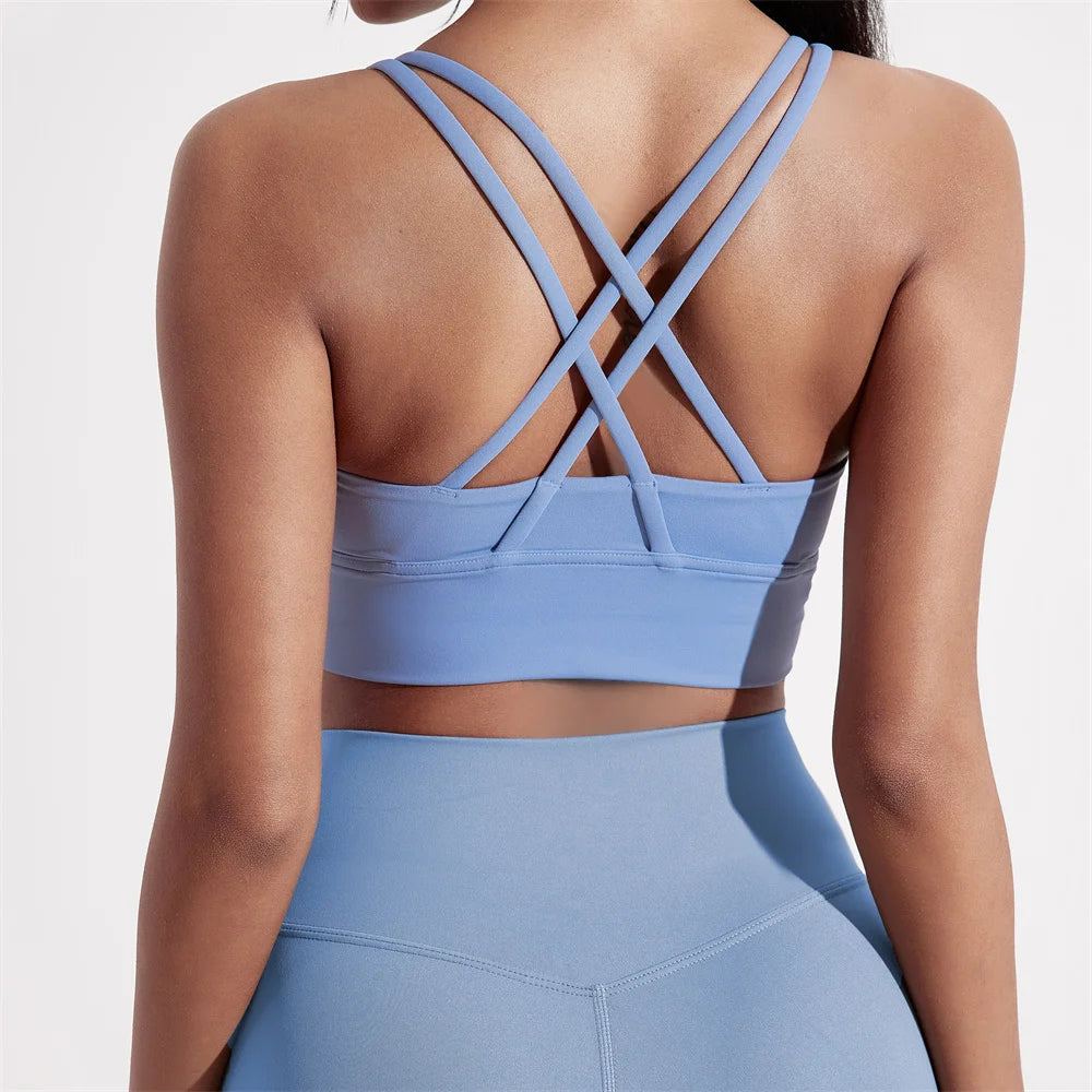 Sujetador deportivo de Color sólido con espalda cruzada para mujer, Top ajustado de alta resistencia, ropa interior de entrenamiento integral para gimnasio y Yoga con almohadilla para el pecho