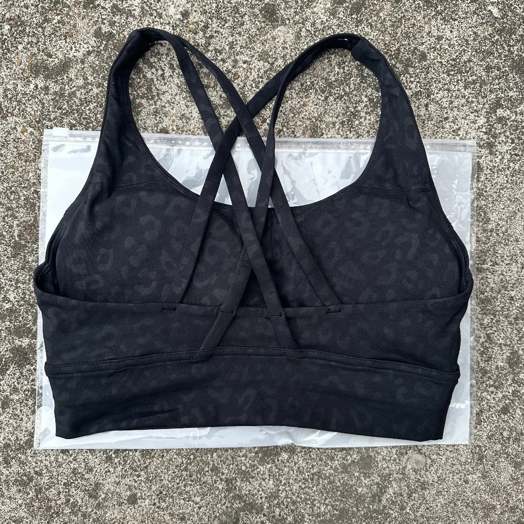 Sujetador deportivo de Color sólido con espalda cruzada para mujer, Top ajustado de alta resistencia, ropa interior de entrenamiento integral para gimnasio y Yoga con almohadilla para el pecho