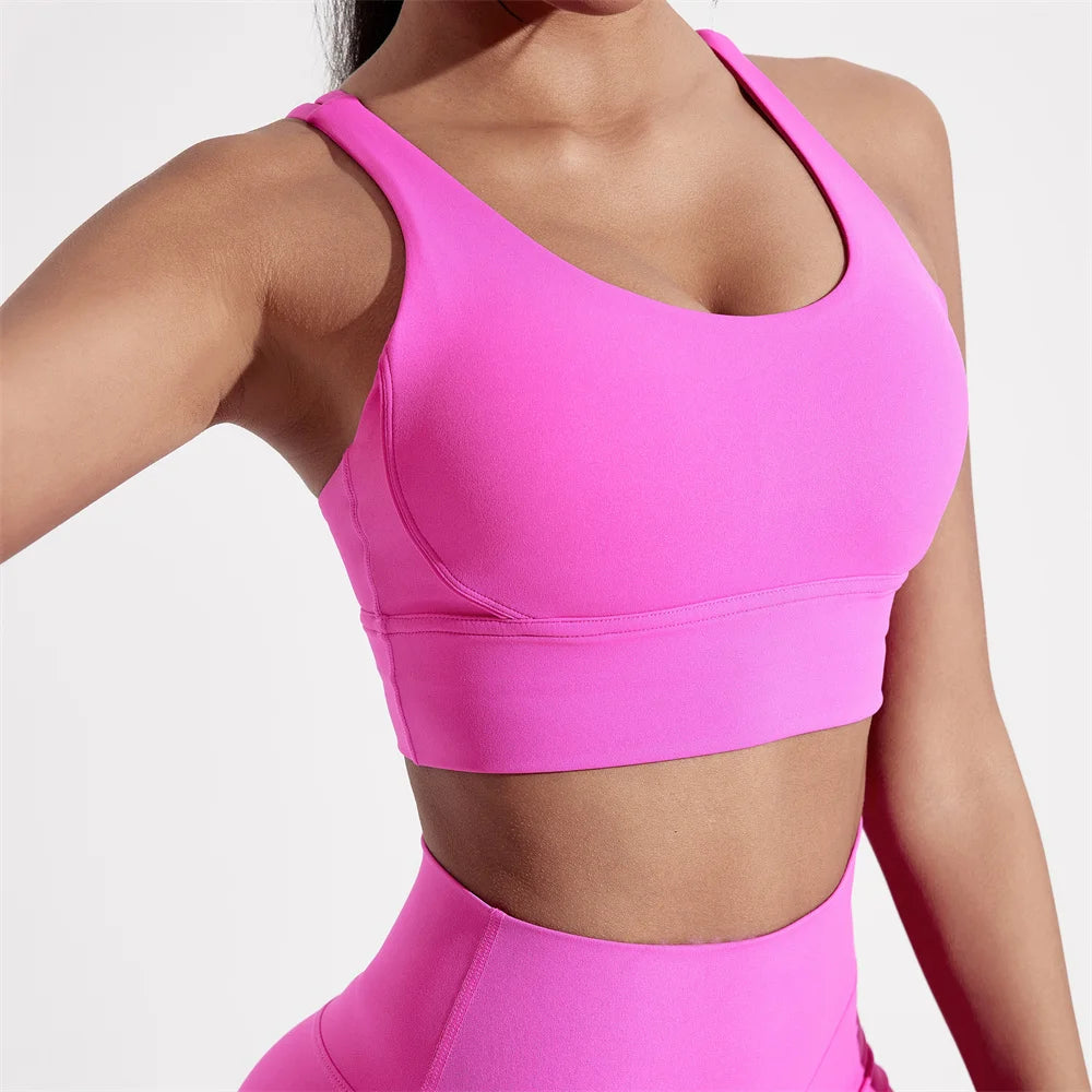 Sujetador deportivo de Color sólido con espalda cruzada para mujer, Top ajustado de alta resistencia, ropa interior de entrenamiento integral para gimnasio y Yoga con almohadilla para el pecho