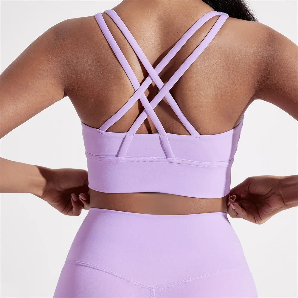 Sujetador deportivo de Color sólido con espalda cruzada para mujer, Top ajustado de alta resistencia, ropa interior de entrenamiento integral para gimnasio y Yoga con almohadilla para el pecho