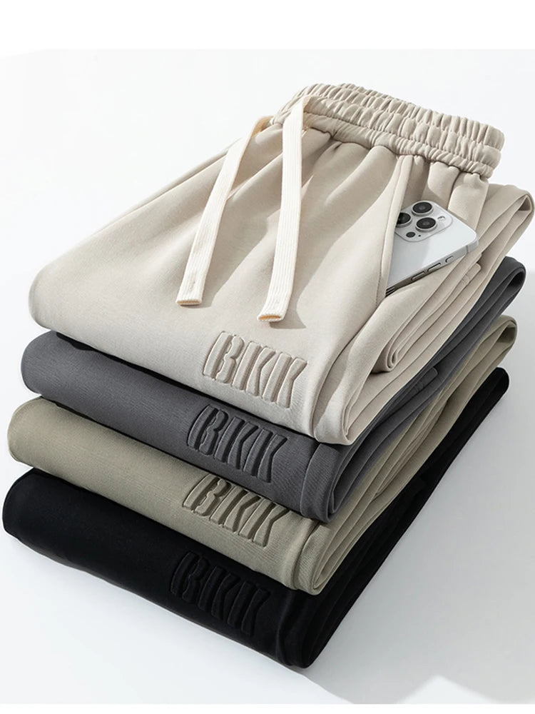 Pantalones de chándal rectos para hombre, pantalones de chándal de algodón de pierna ancha con cordón y letras, pantalones holgados deportivos, pantalones largos informales de talla grande 8XL