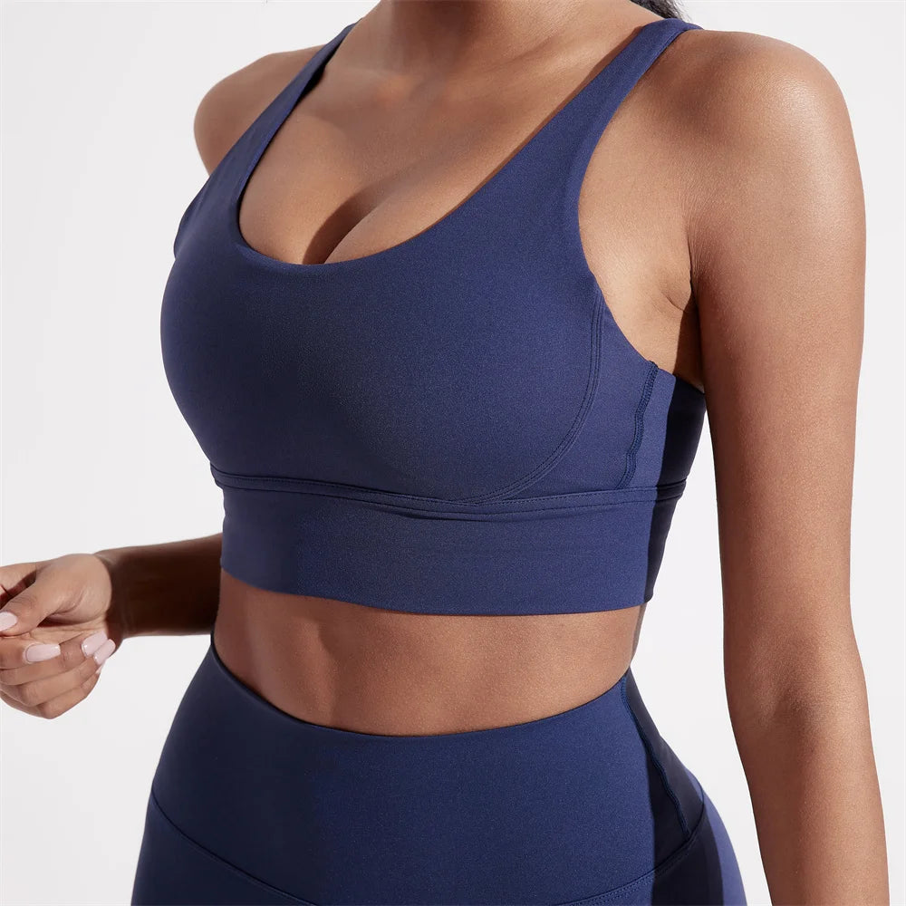 Sujetador deportivo de Color sólido con espalda cruzada para mujer, Top ajustado de alta resistencia, ropa interior de entrenamiento integral para gimnasio y Yoga con almohadilla para el pecho