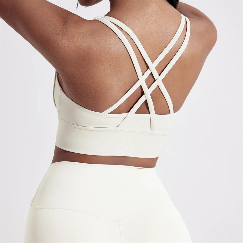 Sujetador deportivo de Color sólido con espalda cruzada para mujer, Top ajustado de alta resistencia, ropa interior de entrenamiento integral para gimnasio y Yoga con almohadilla para el pecho