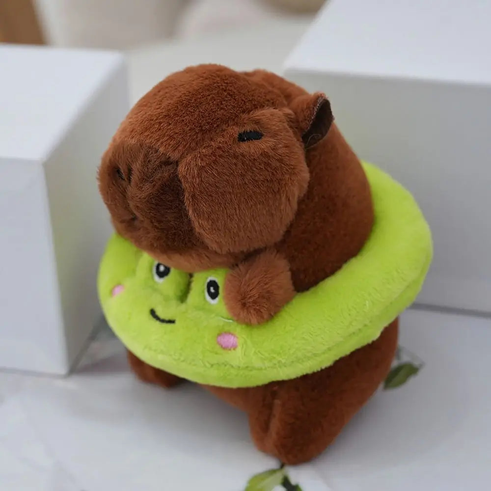 Peluche de capibara con sudadera - Patito verde