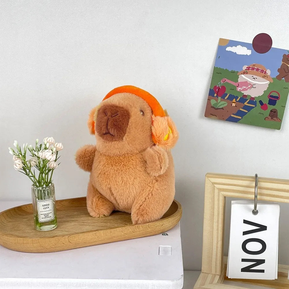Peluche de capibara con sudadera - Audífonos naranja