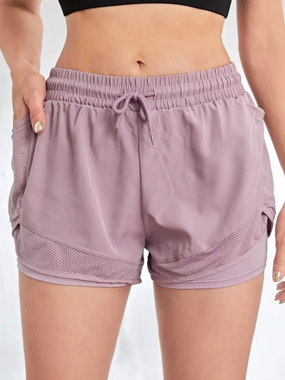 Pantalones cortos deportivos elásticos