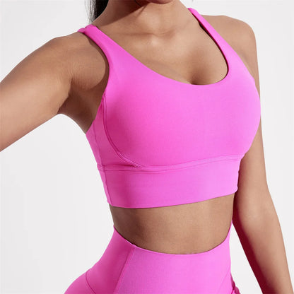 Sujetador deportivo de Color sólido con espalda cruzada para mujer, Top ajustado de alta resistencia, ropa interior de entrenamiento integral para gimnasio y Yoga con almohadilla para el pecho