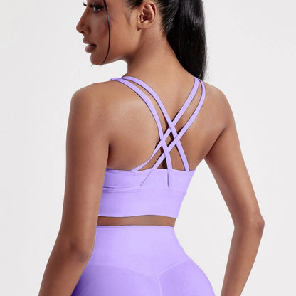 Sujetador deportivo de Color sólido con espalda cruzada para mujer, Top ajustado de alta resistencia, ropa interior de entrenamiento integral para gimnasio y Yoga con almohadilla para el pecho