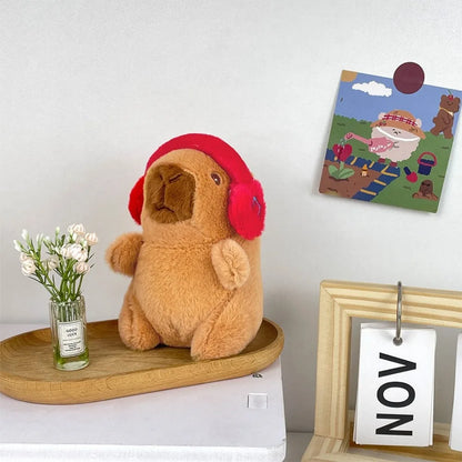 Peluche de capibara con sudadera - Audífonos rojo
