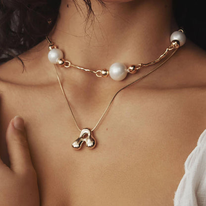 Collar Con Inicial de Acero Inoxidable