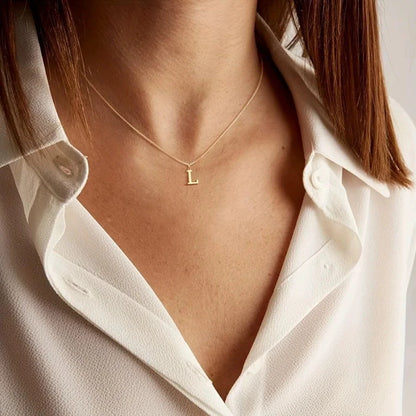 Collar con inicial de acero inoxidable dorado - L / 45 cm